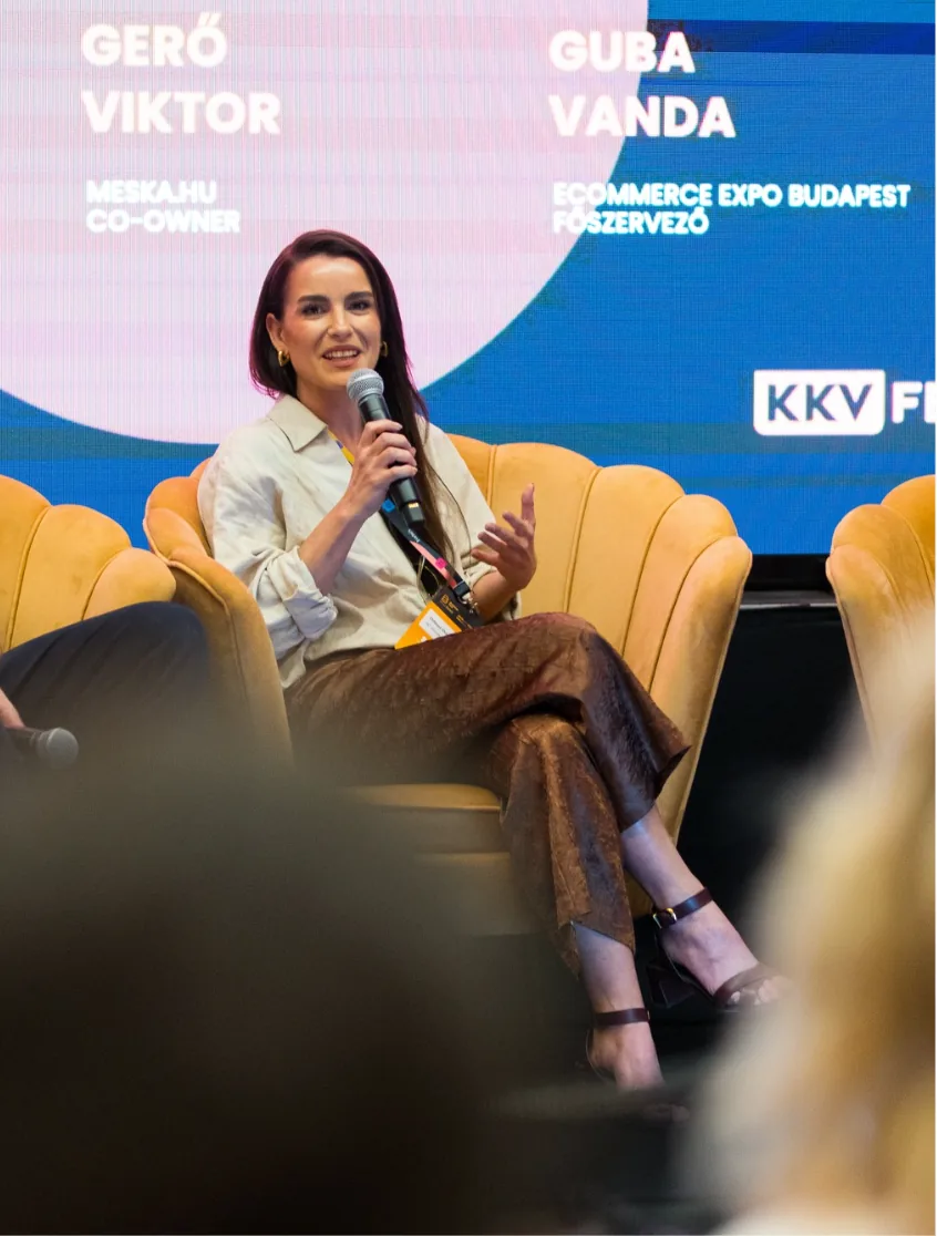 Dorottya Dibusz speaking on stage