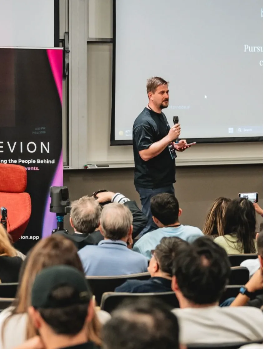 István Lőrincz speaking at an AI event
