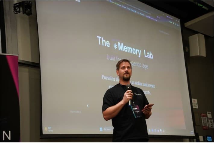 István Lőrincz speaking at the AI Summit at Stanford University